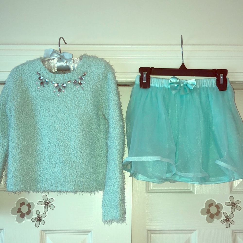 Girls sweater and skirt.